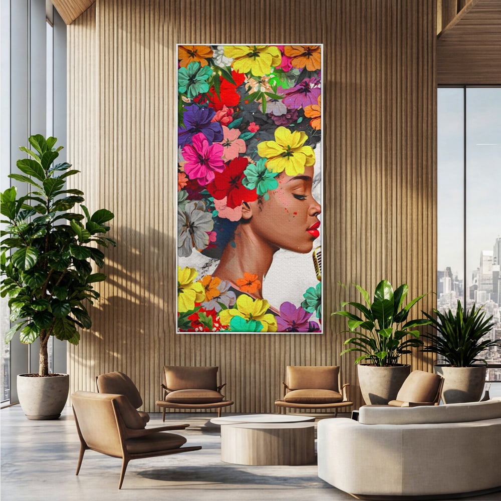 Tablou canvas cu tablou canvas cu fata si flori, in rama de aluminiu argintiu, pe perete intr-un birou